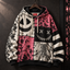 Patchwork Grin Unisex Hoodie — Stitched Smile Pink Gothic Print