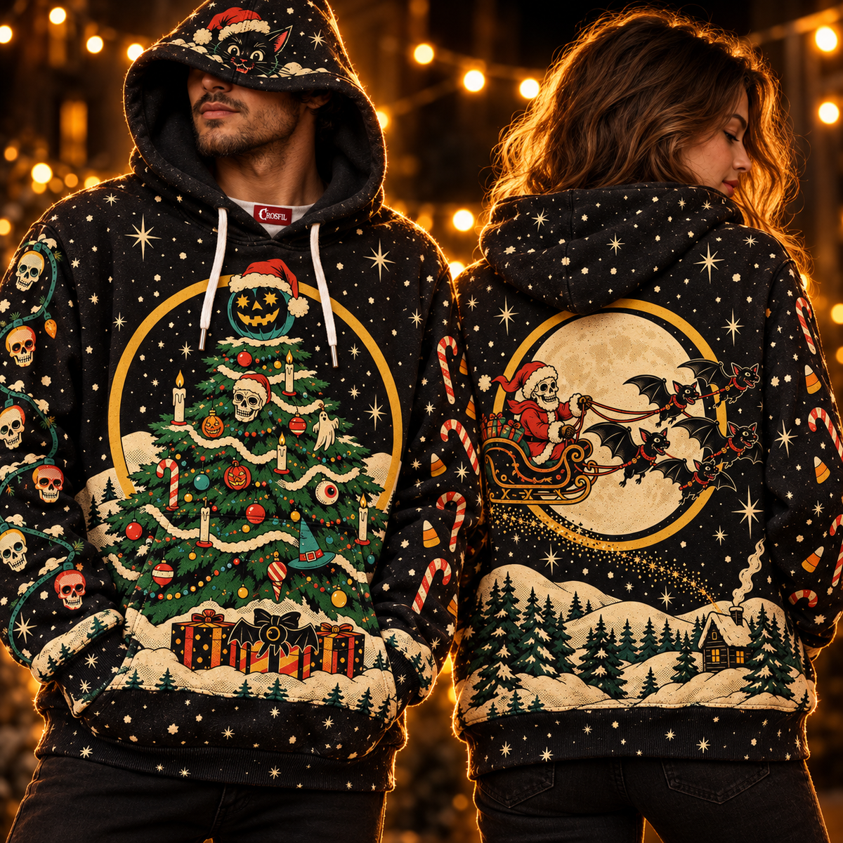 Two people wearing the Deck The Hallows haunted Christmas tree hoodie