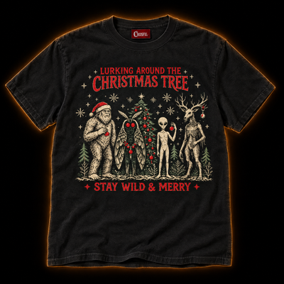 Lurking Around The Tree black cryptid Christmas T-shirt — Bigfoot in a Santa hat, Mothman, alien and antlered forest creature by a Christmas tree