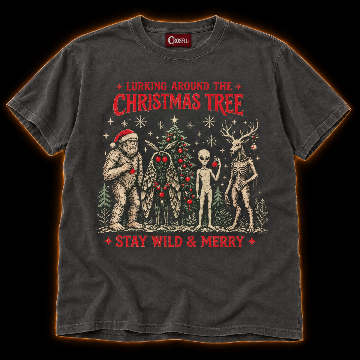 Lurking Around The Tree pepper cryptid Christmas T-shirt — Bigfoot in a Santa hat, Mothman, alien and antlered forest creature by a Christmas tree