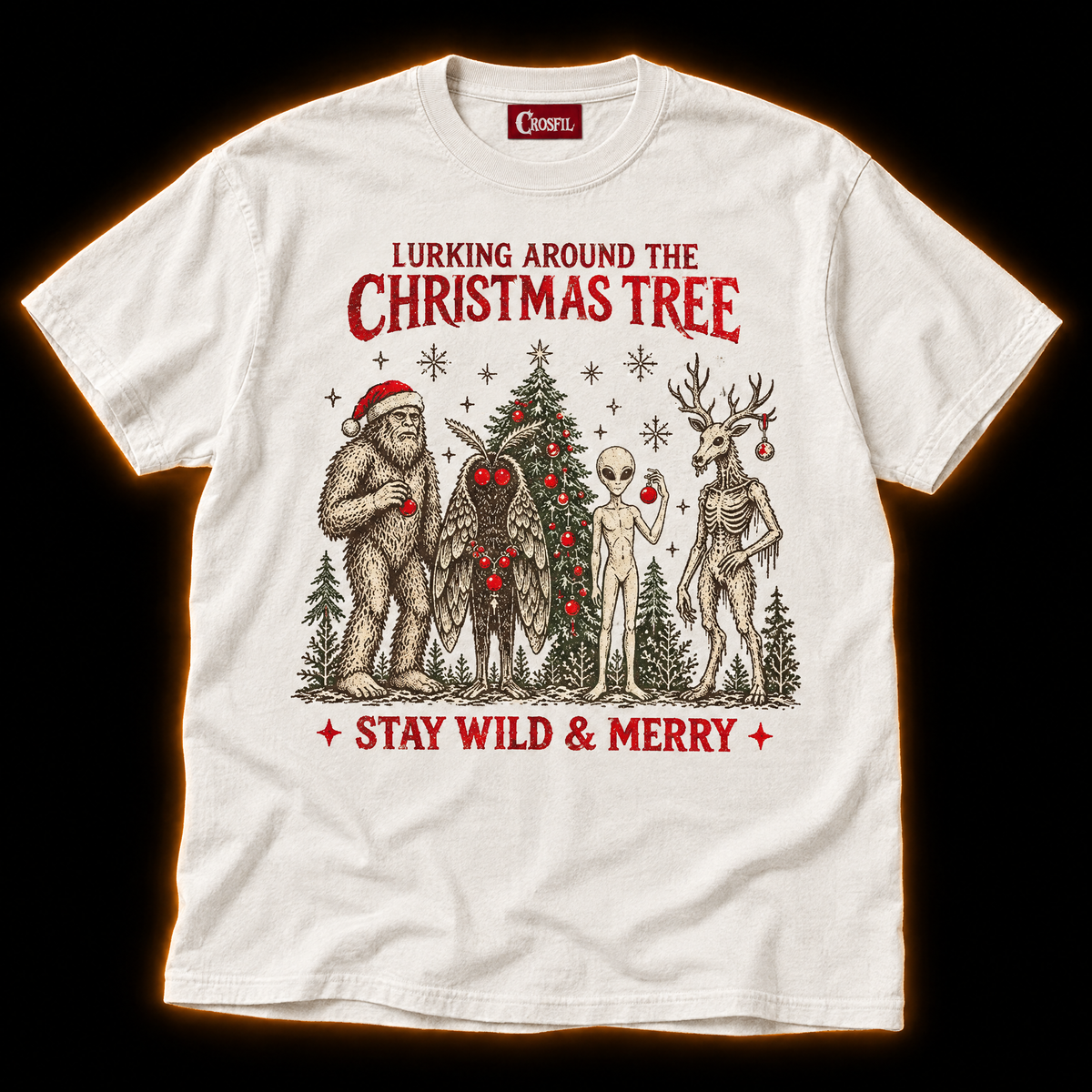 Lurking Around The Tree white cryptid Christmas T-shirt — Bigfoot in a Santa hat, Mothman, alien and antlered forest creature by a Christmas tree
