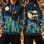 Two people wearing The Lookout Mothman Christmas hoodie